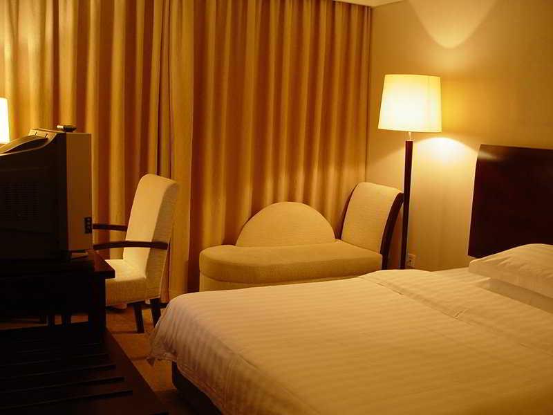 Redwall Hotel Beijing Pequim Quarto foto